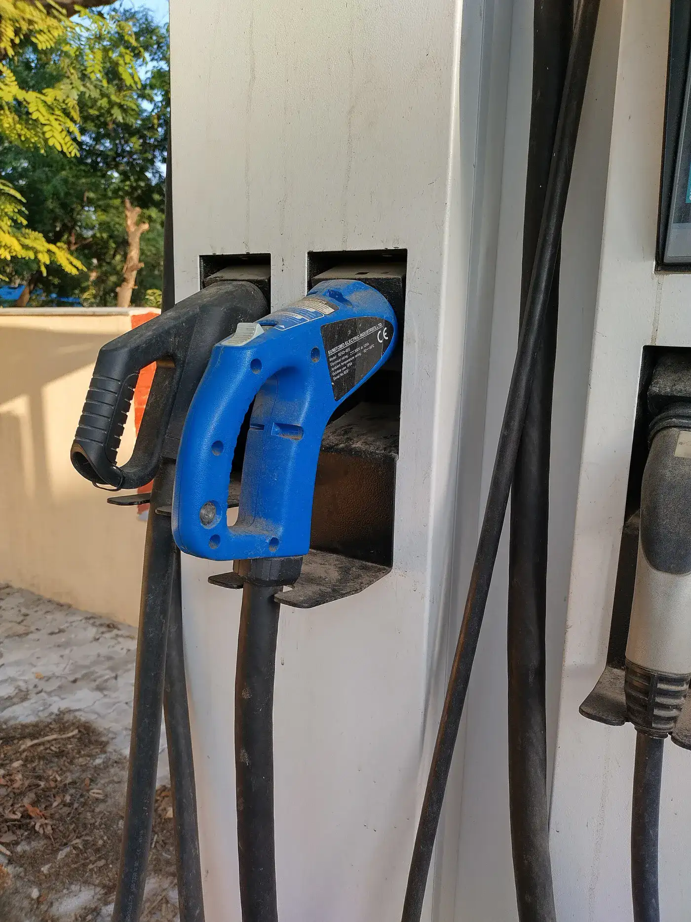 Charging gun and connector ports on an Indian charging unit